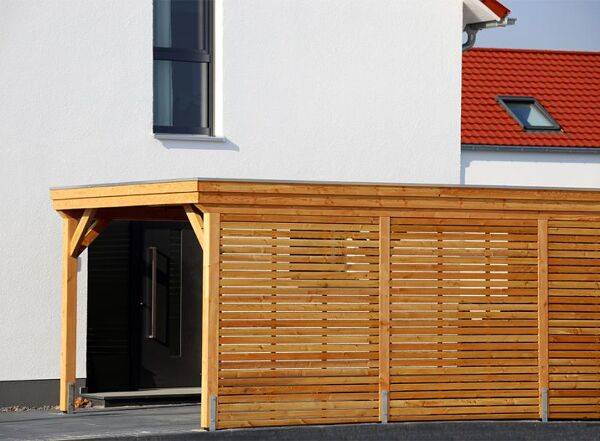 Comment fermer un carport en bois ?