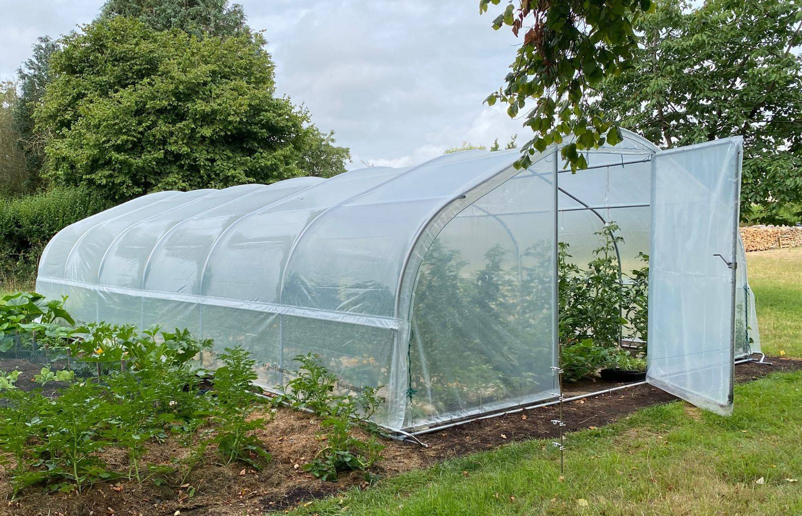 Serre de jardin - 37,5m² - 5 x 7,5m - pied droit 1,20m - polyéthylène haute densité - 1 porte pivotante - aérations latérales - LES SERRES TONNEAU - Image 1