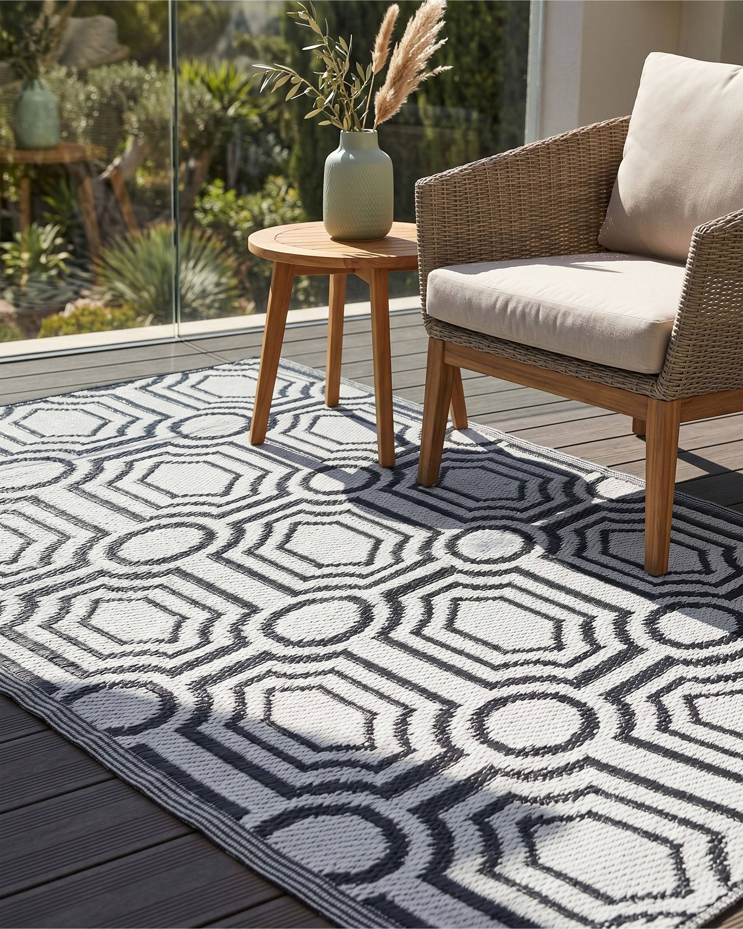 Beliani - Tapis d'extérieur Polypropylène Noir BIDAR - Beliani - Image 1