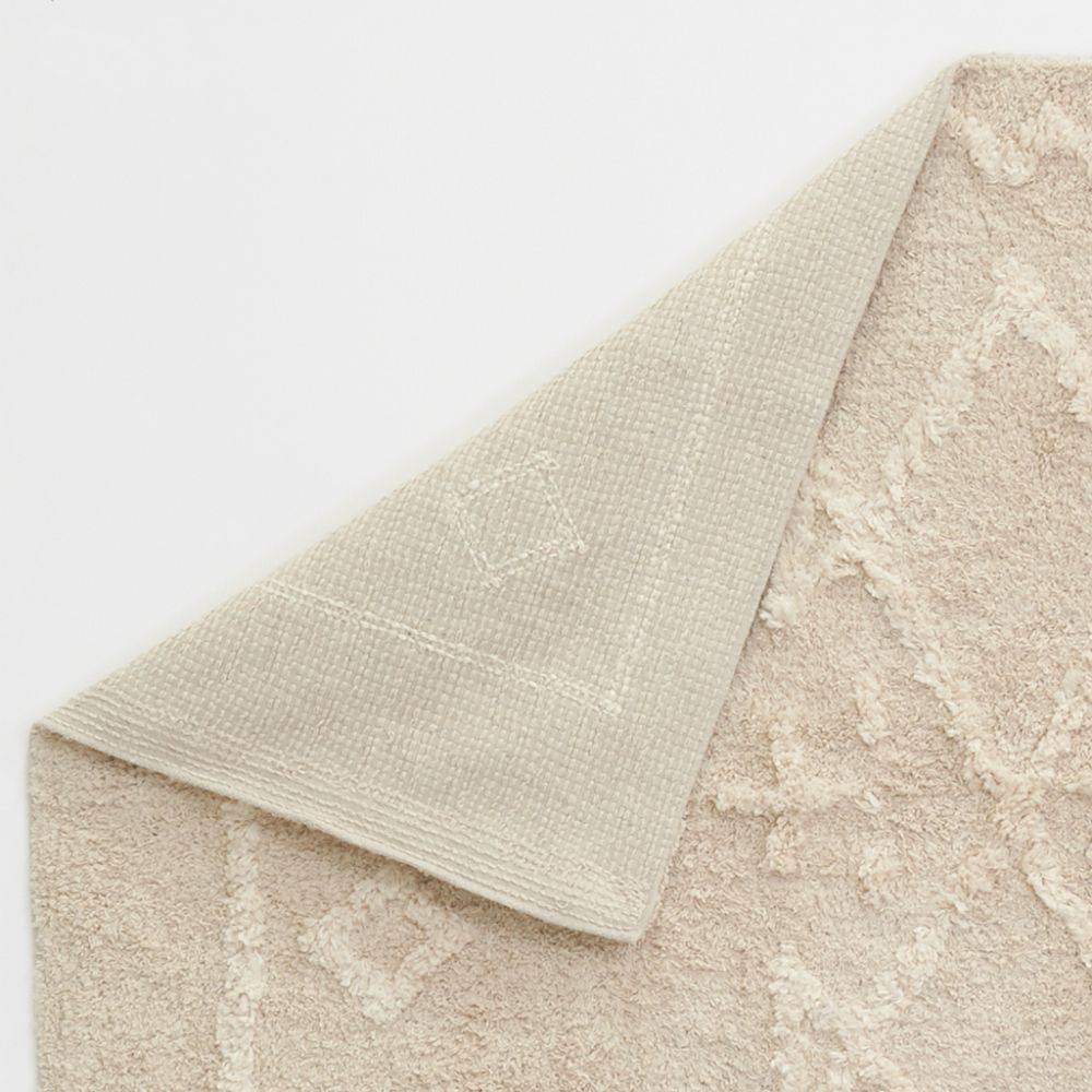 Aubry Gaspard - Tapis en coton tufté écru motifs ethniques 90 x 150 cm - Image 3
