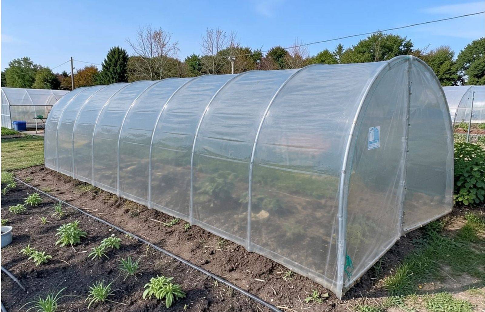 Serre tunnel de jardin - 36m² - 3 x 12 m - pieds arrondis - polyéthylène haute densité - 2 portes pivotantes - LES SERRES TONNEAU - Image 1