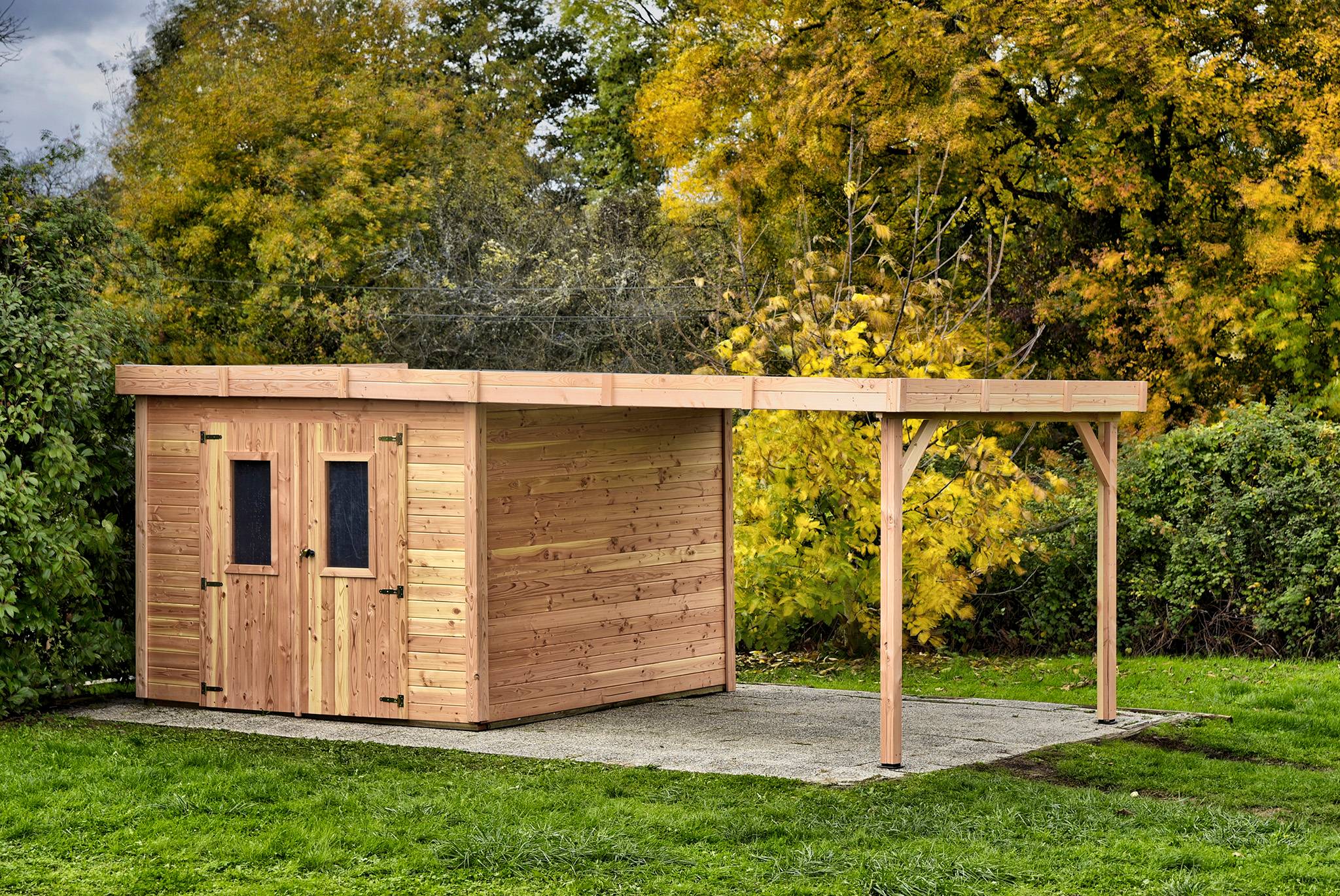 Habrita - Abri Madriers bois massif - 28 mm- surface extérieur 18,36 m2 avec bûcher - Toit plat - couverture polycarbonate - Image 1